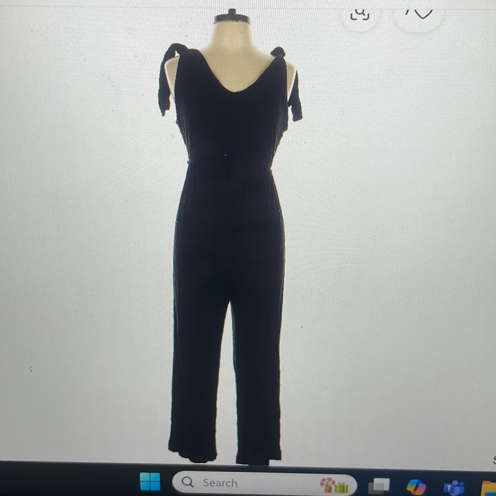 Lisa & Lucy black pant jumpsuit with tie shoulders and adjustable tor belt.